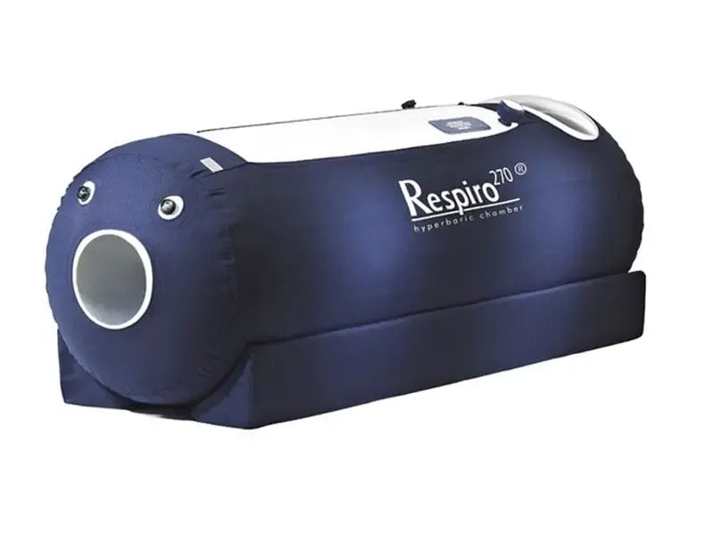 The OxyHealth Respiro 270® chamber at an angle on its base frame, its end viewing window facing out.