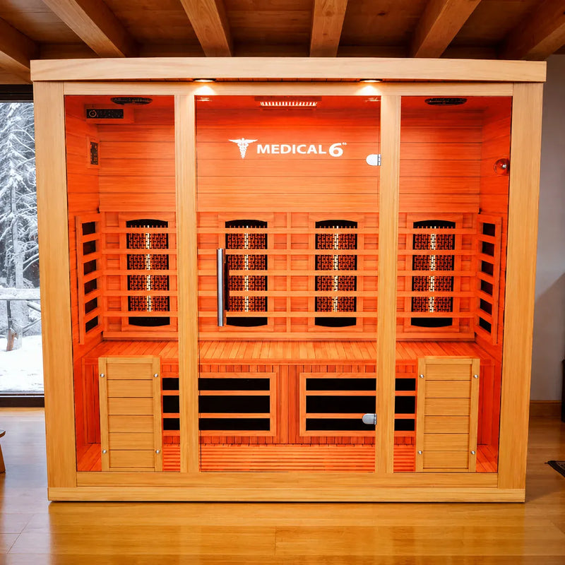 Medical 6 infrared sauna with full-glass front, wooden interior, and carbon heating panels.
