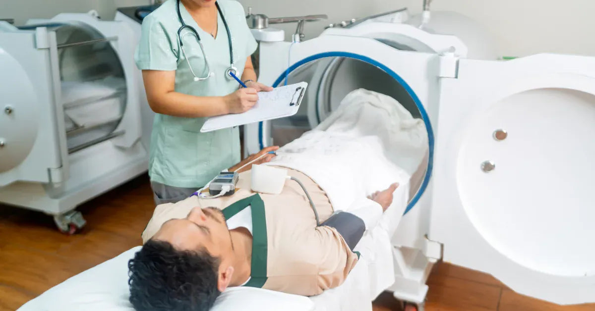 Image of a person receiving hyperbaric oxygen therapy inside a modern monoplace chamber.