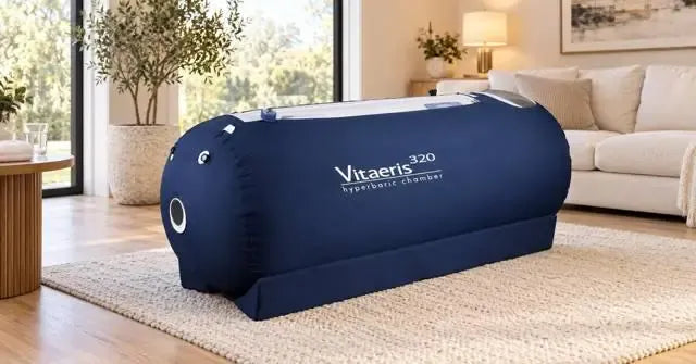 The OxyHealth Vitaeris 320 hyperbaric oxygen chamber in a bright living room, one of two rent to own hyperbaric chamber options from Airpuria.