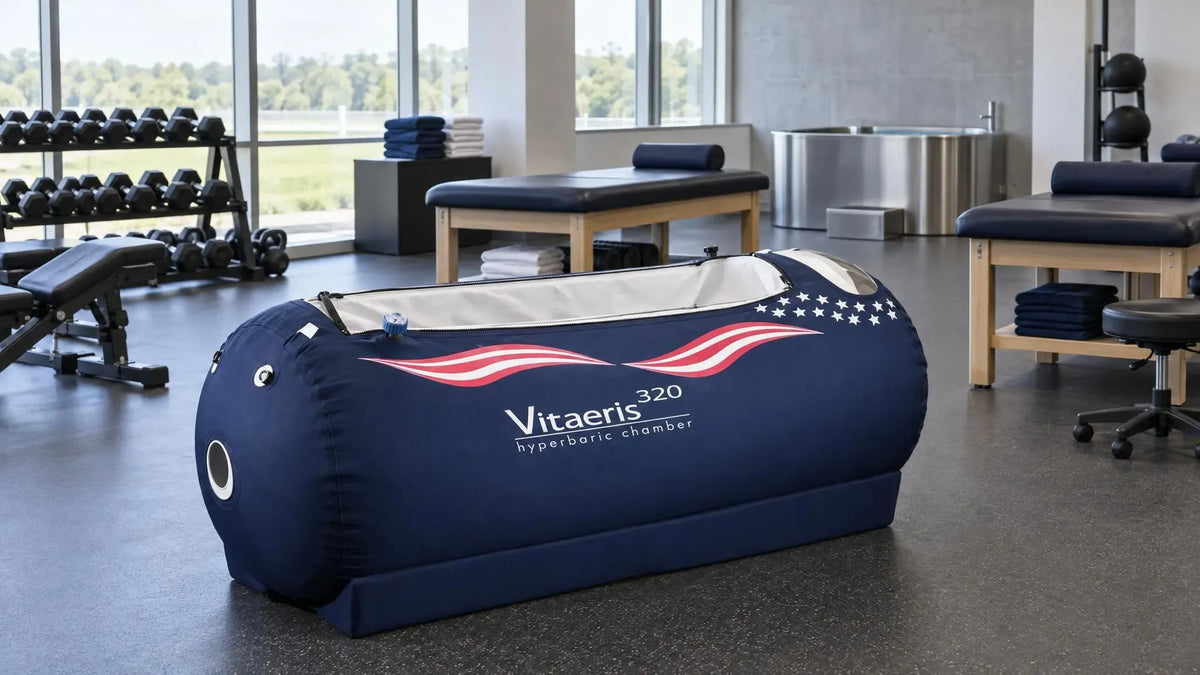 A professional team recovery room with an OxyHealth Vitaeris 320® chamber on the floor.