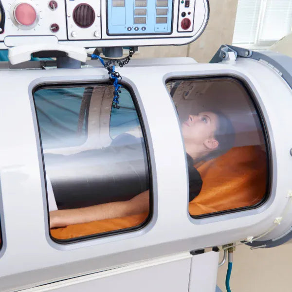 Image of a person during a hyperbaric oxygen therapy session.
